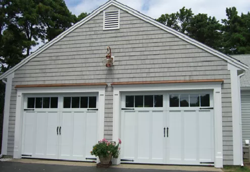 You can also get some great effects by positioning new garage door windows vertically.